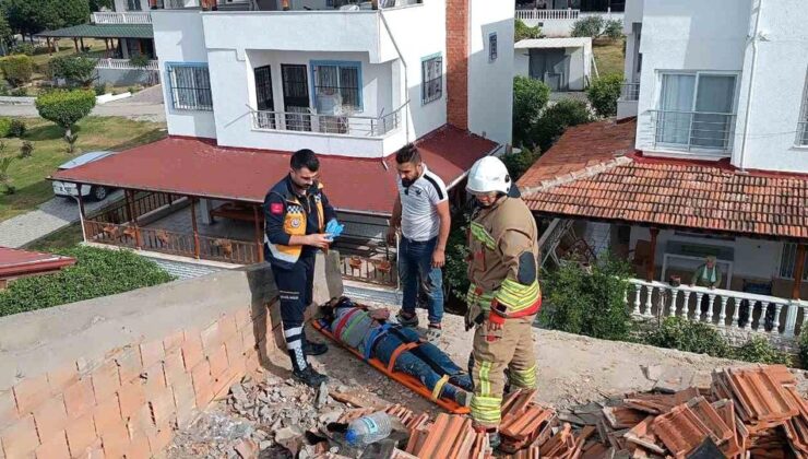 Çatı tadilatında üzerine su deposu devrilen personel yaralandı